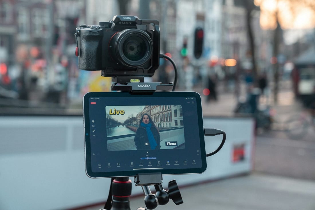 Camera and tablet on tripod for video marketing content production