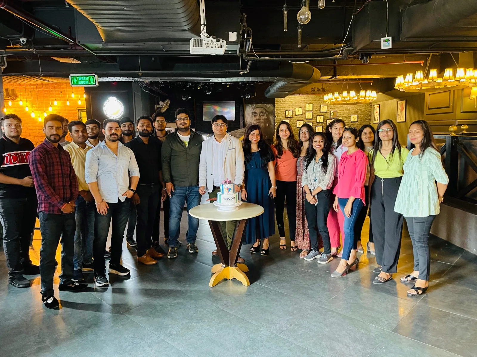 Team gathering at a company milestone celebration