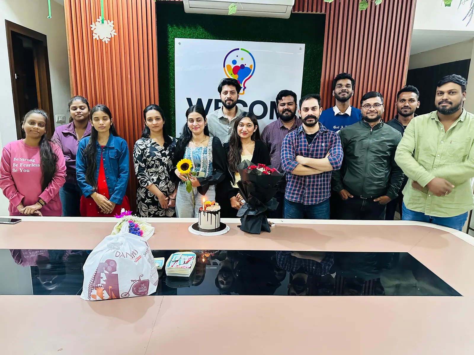 Wbcom Designs team celebrating a release