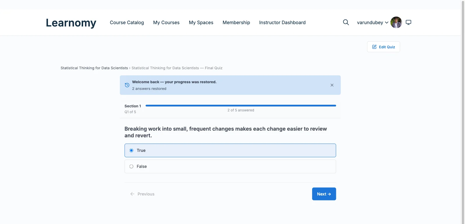 Learnomy quiz player with a sectioned exam layout and progress restore