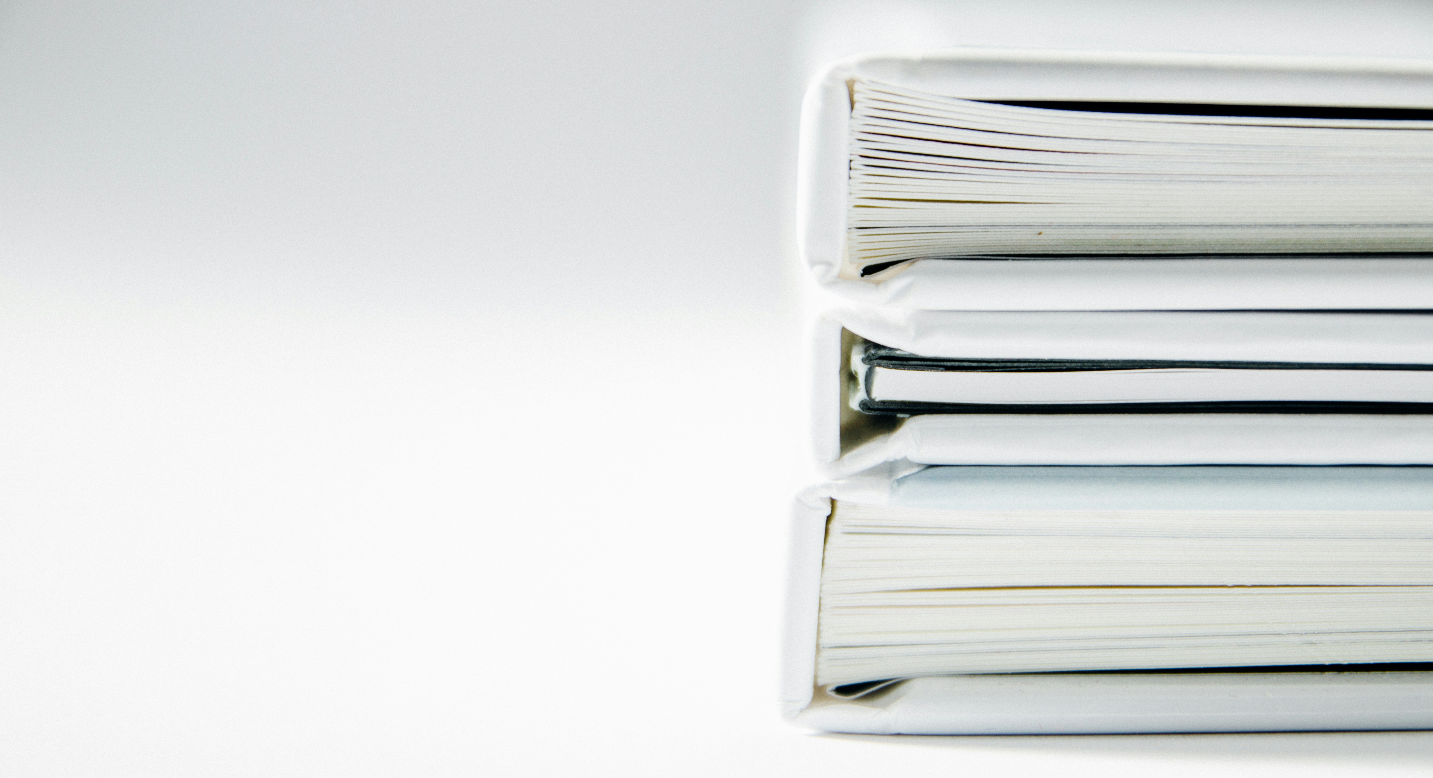 A stack of organized folders, representing WordPress digital asset management plugins for the media library