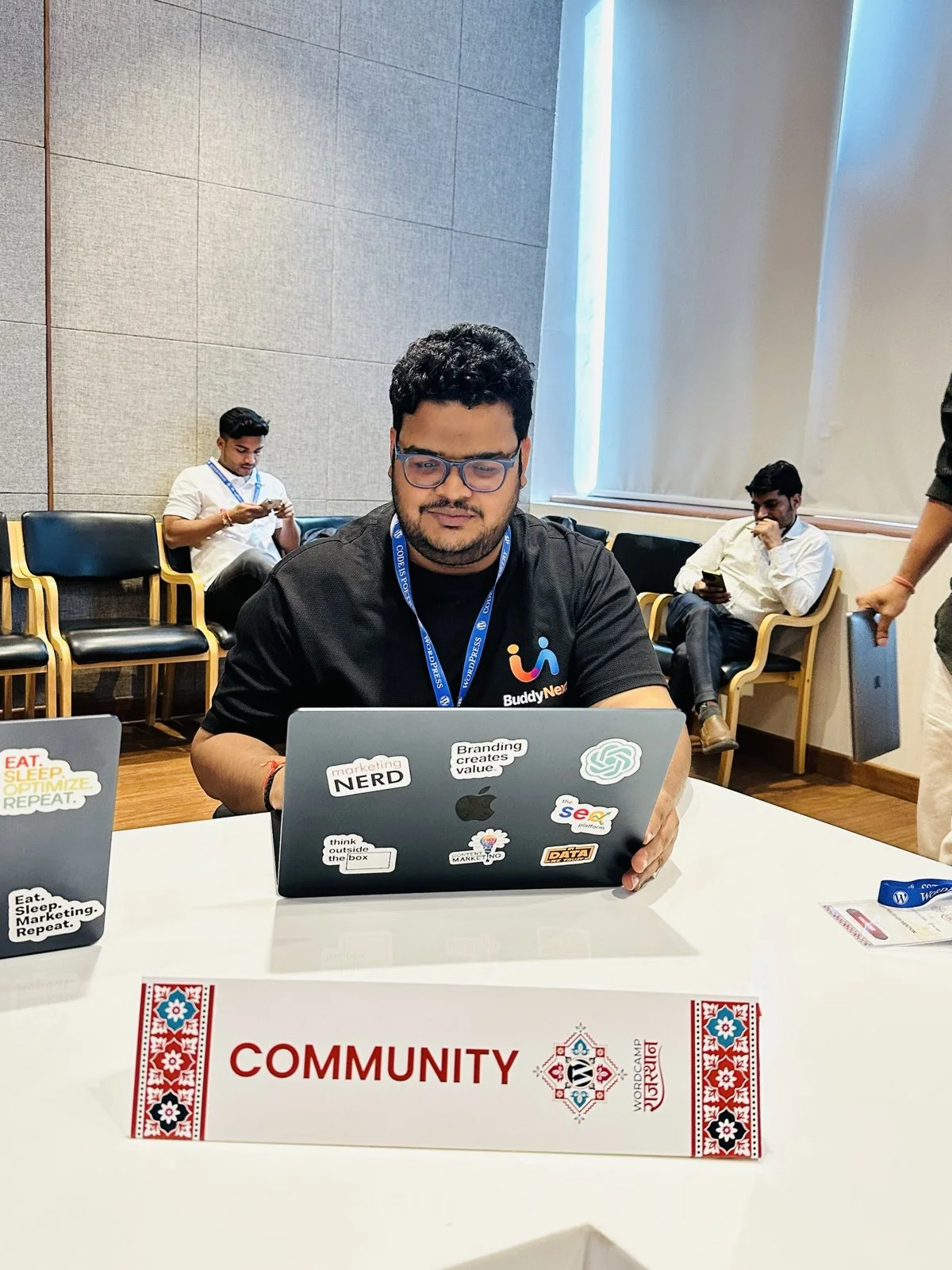 Shashank Dubey working at the Community table at WordCamp Rajasthan 2026